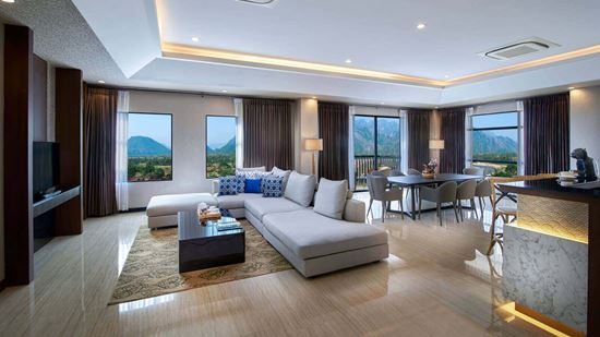 Kitchenette and dining area in Executive One Bedroom Suite River View with Balcony